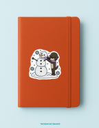 Lucy Building a Snowman Sticker