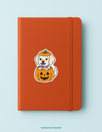Dog in a Pumpkin Costume Sticker