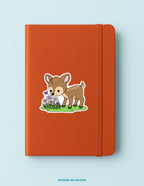 Deer Smelling Wildflowers Sticker